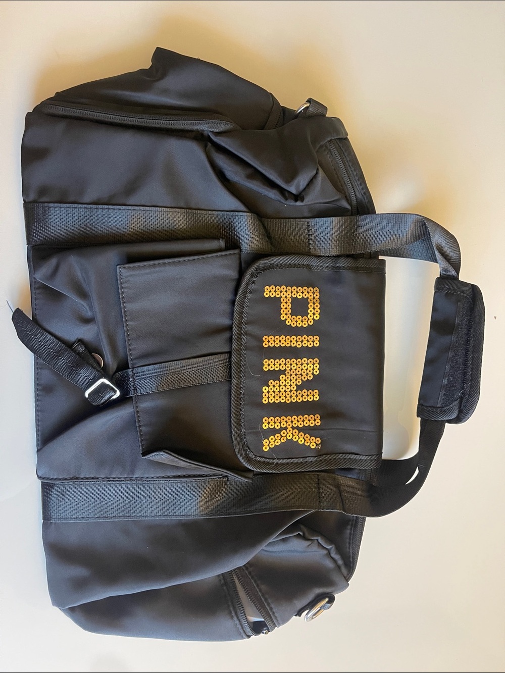 PINK Black Nylon Duffel with Yellow Sequin Logo